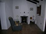 Living room with antic chimney