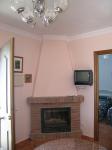 Living-room with wood burner